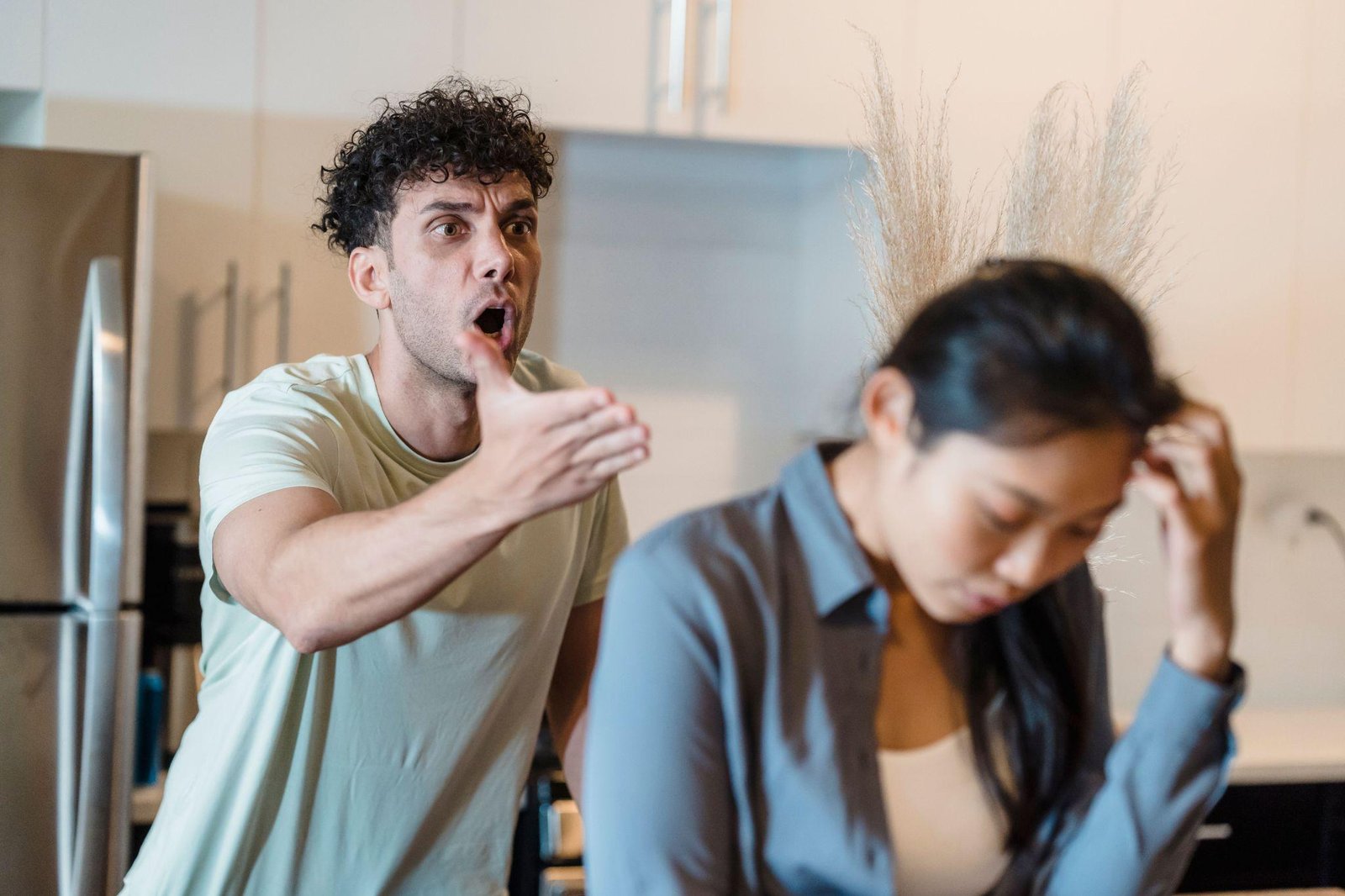 Couple sitting apart, facing relationship difficulties